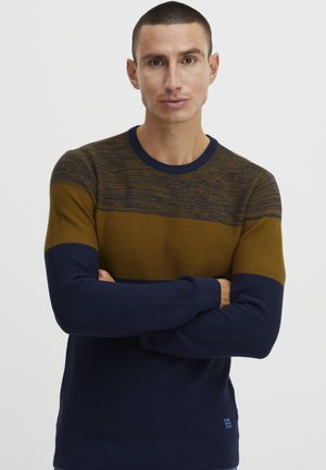 Knitted sweater with a round neckline featuring horizontal stripes in dark blue, mustard yellow, and a textured upper panel.