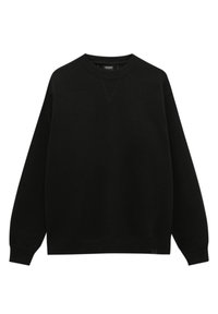 Svart sweatshirt i bomull. Har rund halsringning, långa ärmar, ribbad mudd och nederkant, med en subtil V-formad söm vid halsen.