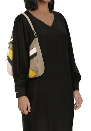 Soft leather shoulder bag in taupe, featuring yellow, white, and black stripes. It has a curved, streamlined design with a single strap.