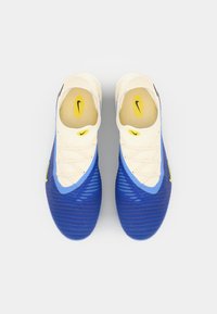 Blue soccer shoes featuring a textured upper, white accents, yellow logo, and a streamlined silhouette with a lace-up closure.