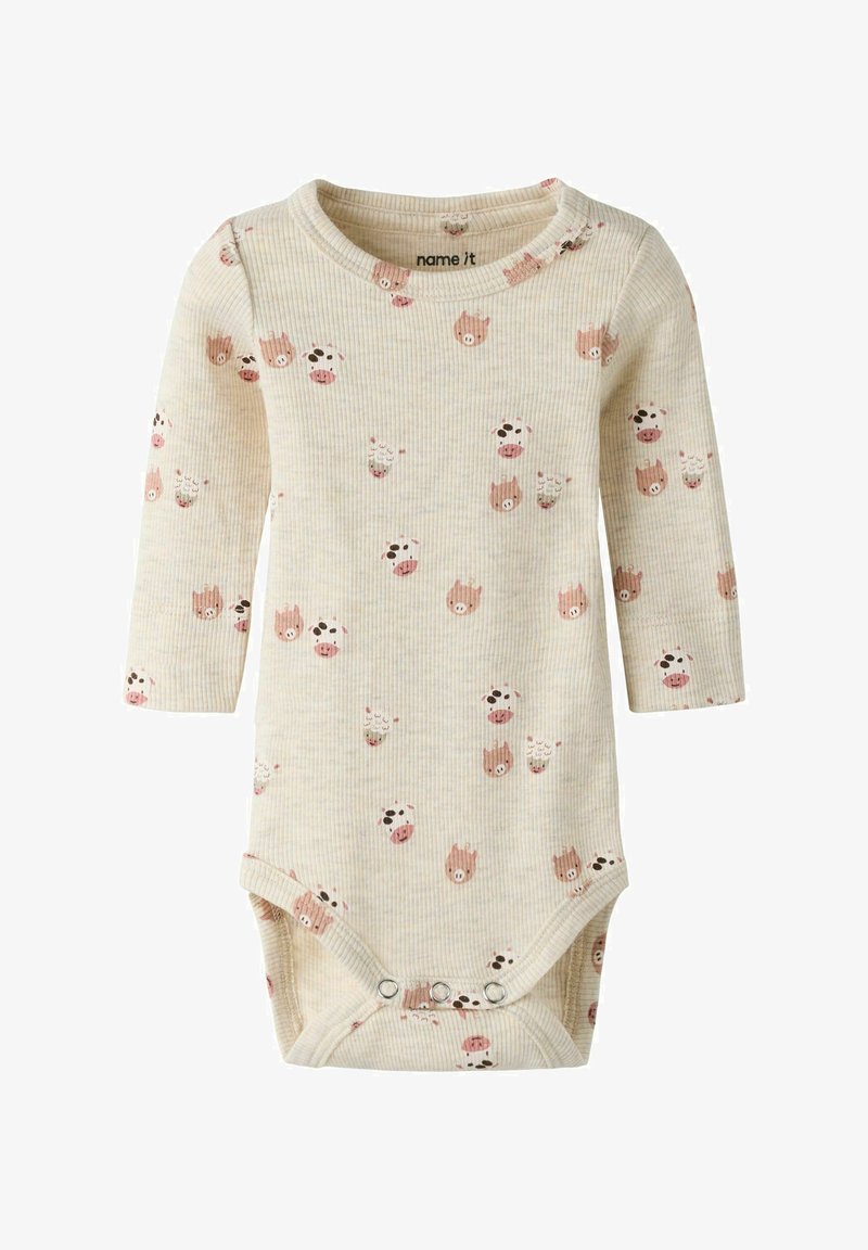 Body en coton à manches longues de couleur crème avec une texture côtelée, présentant des imprimés d'animaux roses et marron. Fermeture à pression en bas pour un habillage facile.