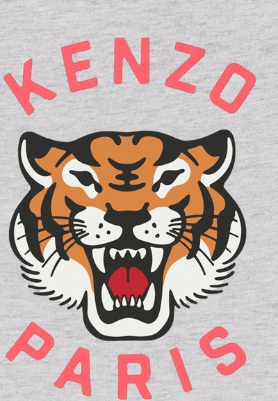 Le tissu gris présente un graphique audacieux de tête de tigre en orange, noir et blanc, avec "KENZO" au-dessus et "PARIS" en dessous en lettres roses.