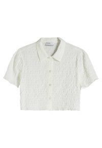 White cropped shirt with short sleeves, button front, and textured fabric featuring small horizontal gathers. Collared design.
