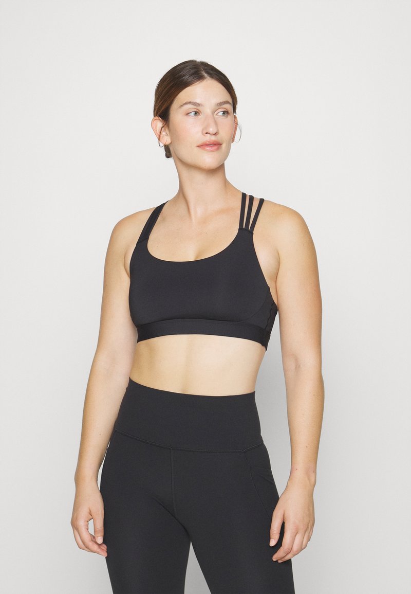 Athleta TRAIN FREE Light support sports bra black Zalando.ie