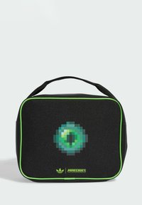 Borsa di tessuto nero con un design a occhio verde pixelato, rifinita in verde brillante. Presenta una maniglia superiore e il logo di Minecraft.