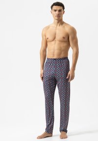 Katoenen loungebroeken met een blauw en rood geometrisch patroon, elastische tailleband en recht gesneden ontwerp. Glad textuur en lichtgewicht.