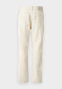 Crème kleurige broek van katoen met een rechte pijp. Kenmerken zijn onder andere twee achterzakken, een taillebandlabel en nette stiksels.