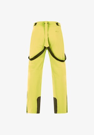 Vihreät vedenpitävät housut, joissa on ruskeita yksityiskohtia. Varustettu säädettävillä hihnoilla, vetoketjullisilla sivutuulettimilla ja suoralla leikkauksella.