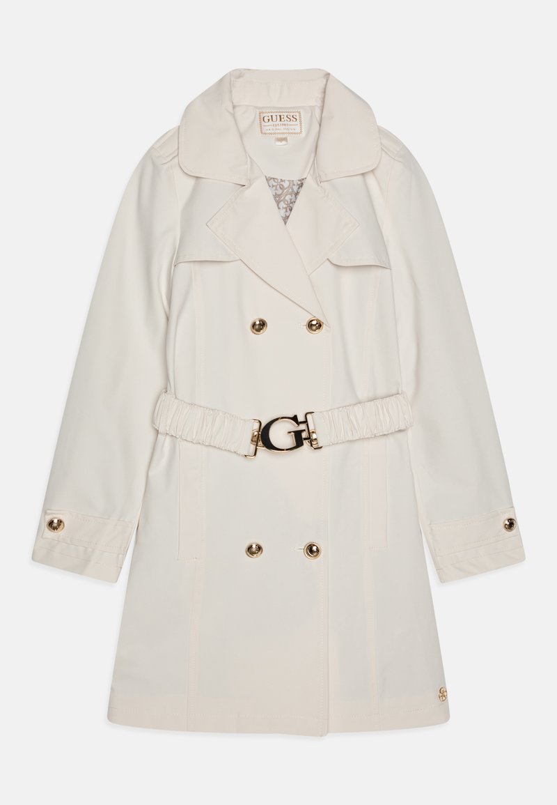 Beige színű, könnyű anyagból készült trench coat, dupla gombolású dizájnnal, arany árnyalatú gombokkal és övvel ellátott derékkal, amely logóval díszített.