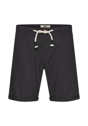 Sorte shorts laget av stoff med en glatt tekstur. Har en rullet kant, frontlomme og en kremfarget snor i midjen.