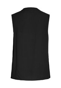 Musta ilmanhihainen paita, jossa on suora leikkaus, sileä tekstuuri ja pienet sivuaukot. Klassinen kaulus ja siistit saumat.