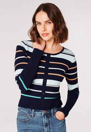 Navy ribbed cardigan with horizontal stripes in light blue, white, orange, and teal. Features a round neckline and full button closure.