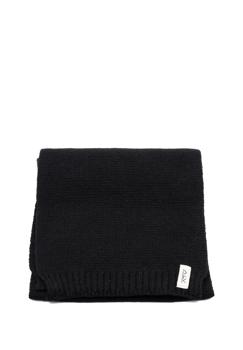 Sciarpa nera lavorata a maglia con tessuto testurizzato, bordi a coste e una piccola etichetta del marchio su un lato.