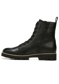 Black leather ankle boot with a textured finish, lace-up front, side zipper, and a rugged rubber sole for traction.