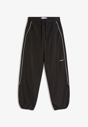 Black lightweight pants with an elastic waistband, drawstring, and white side piping. Features a loose fit and gathered cuffs.