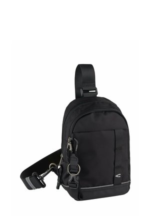 Compact black crossbody bag with adjustable strap, front zip pocket, and keyring clip on a white background.