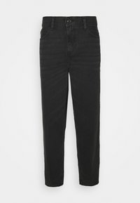 UNISEX - Calças de ganga de corte relaxado - black denim