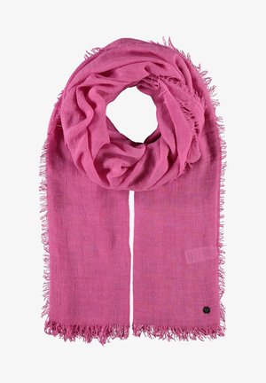 Różowy pleciony szalik z frędzlami, o miękkiej teksturze i okrągłym wzorze. W pobliżu końca widoczna jest mała czarna metka.