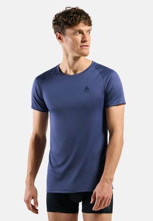 Navy blue athletic shirt with short sleeves, round neckline, and a textured fabric. Features a small black logo on the chest.