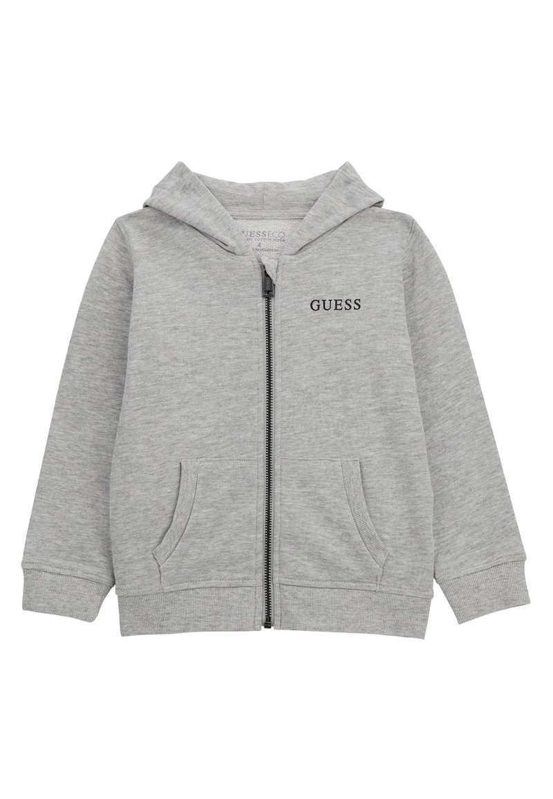Haut à capuche zippé gris en coton doux, doté d'une poche kangourou, d'une capuche avec cordon de serrage et d'un logo "GUESS" noir sur la poitrine.