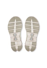 Running shoe soles featuring multi-textured rubber with a light tan color, visible tread patterns, and a midsole with Cloudtec branding.
