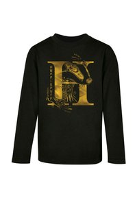 Musta pitkähihaisen paita, jossa on kultainen grafiikka lumikon kuvasta ja sana "HUFFLEPUFF", taidokkaasti suunnitellut elementit integroituina kuvaan.