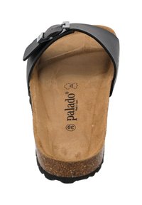 Sandalia negra de pala ancha con hebilla, plantilla texturizada y suela de corcho, etiquetada "palado" y talla 39 en su interior.