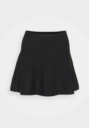Black flared skirt made of soft fabric, featuring a smooth texture and an elastic waistband for comfort. Hem finishes in a gentle curve.