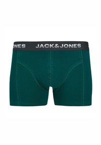 Männer-Boxershorts aus dunkelgrünem Baumwollstoff mit einem schwarzen elastischen Bund, der das „JACK & JONES“-Logo in Weiß trägt. Flachnähte für zusätzlichen Komfort.