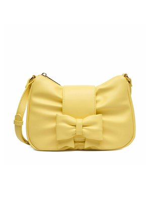 Żółta torebka na ramię z regulowanym paskiem i wyraźną kokardą z przodu, gładka tekstura i zapięcie na suwak od góry.