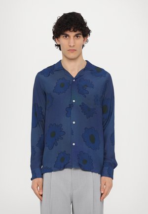 Blue floral shirt with a lightweight fabric, featuring large dark blue flowers and black centers, button-down front, and a relaxed collar.