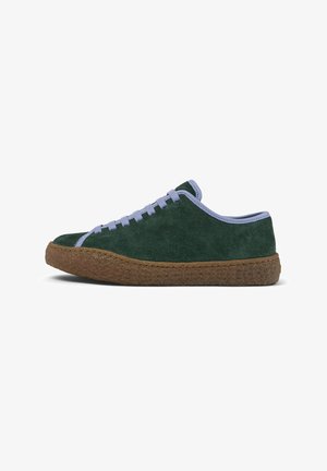 Green suede sneakers with lavender laces and a textured brown rubber sole. Rounded toe and low-profile design. Classic lace-up style.