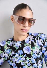 Lunettes de soleil - nude