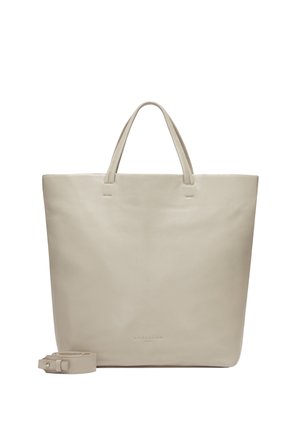 Leder Tragetasche in hellem Beige mit zwei oberen Griffen, minimalistisches Design und einem abnehmbaren Schultergurt. Glatte Textur, Logo auf der Vorderseite geprägt.