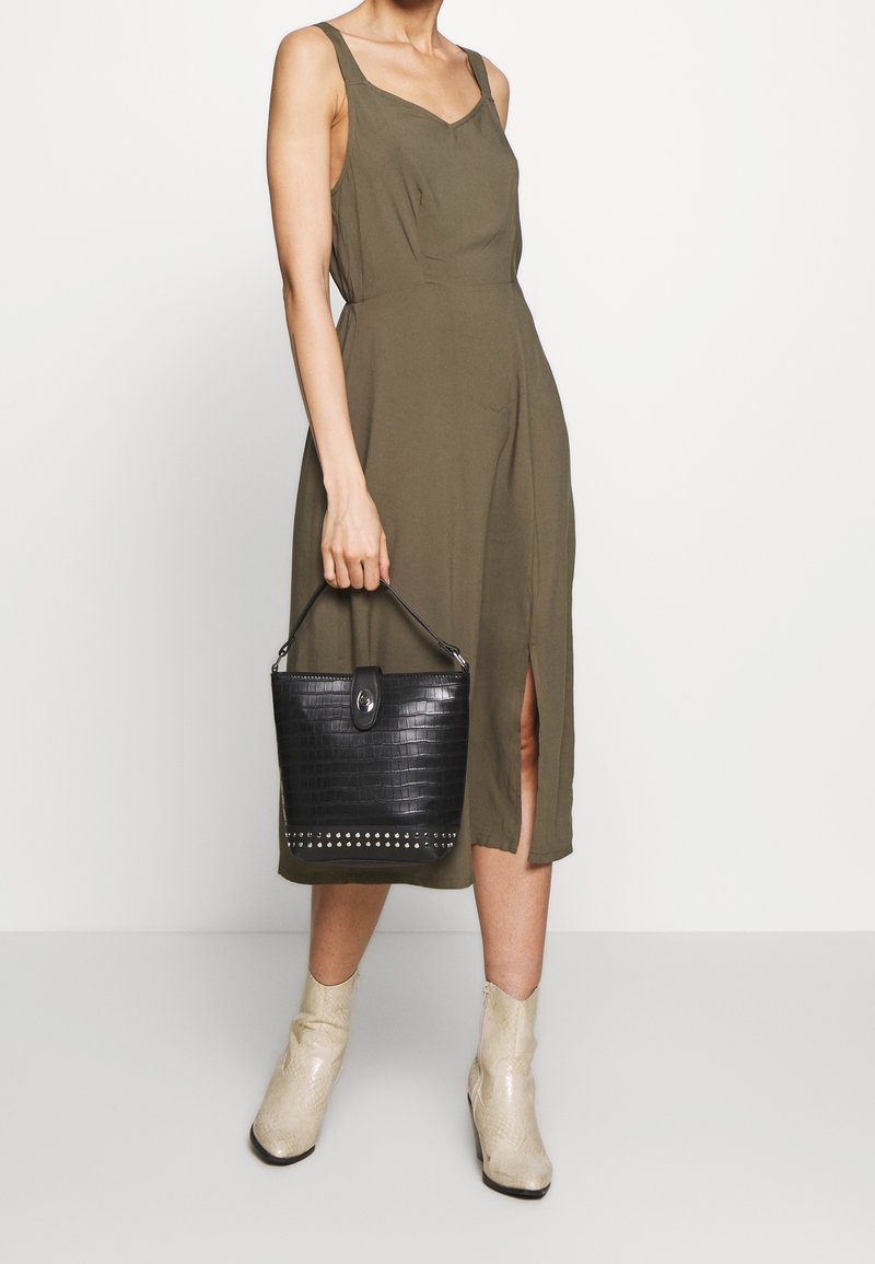 green emerald velvet dress Vero Dress In Olive Green Doppio Satin