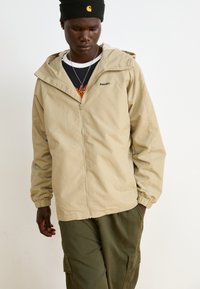 HUF UNISEX - Soft shell striukė - putty