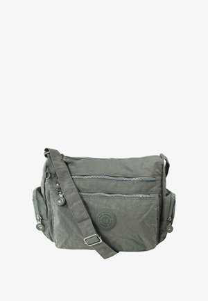 Grijze canvas schoudertas met een vooraan aangebrachte logo patch, twee ritszakken aan de buitenkant, zijzakken en een verstelbare schouderband.