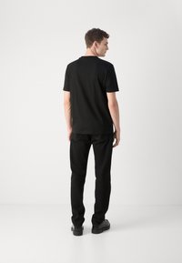 HUGO DIGNITEY - T-shirt med print - black