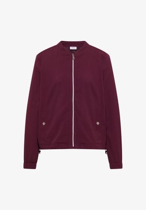 Maroon bomber jacket with front zipper, two snap-button side pockets, elastic cuffs, and stand collar, made from textured fabric.