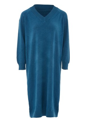 Vihreä neulemekko, jossa on V-pääntie, kolmivartaloiset hihat ja ribrafoidut hihansuut. Silkkinen pinta ja polvitason muotoilu rento malli.