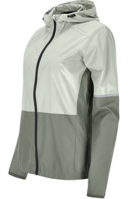 Lichte gewatteerde jas met capuchon in lichtgroen met een donkerder groene ondersectie. Voorzien van een rits, verstelbare capuchon en een slanke, glanzende afwerking.