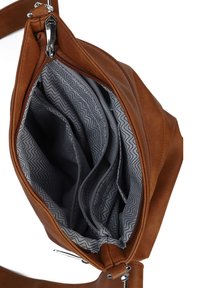 Braune Lederhandtasche mit einem Reißverschluss, ausgestattet mit einem grauen Zickzack-Musterinnenfutter und mehreren Fächern zur Organisation.