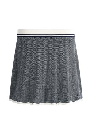 Navy blue and white knit pleated skirt with chevron pattern, ribbed waistband with double navy stripes, and scalloped hem.