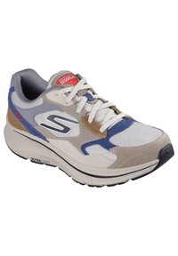 Sneaker légère avec un mélange de matériaux gris, bleu et beige, dotée d'un col rembourré, d'un système de laçage et d'une semelle en caoutchouc marquée "ULTRA LÉGER."