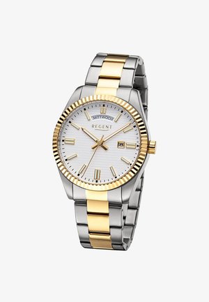 Silver and gold metal wristwatch with white textured dial, gold hour markers, day and date display, and fluted gold bezel.