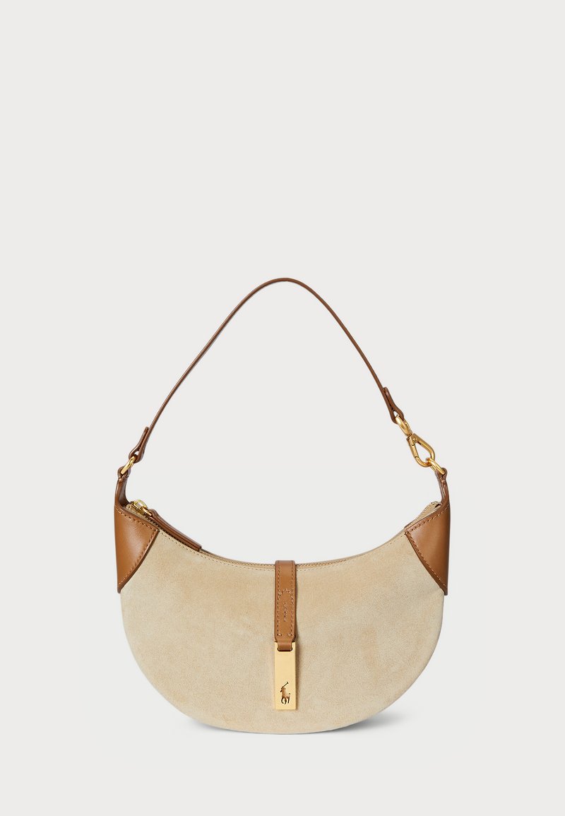 Bezēda zamšsoma ar brūnām ādas detaļām. Izliektas formas un īsa plecu siksna. Zelta krāsas detaļas aizdares daļā.