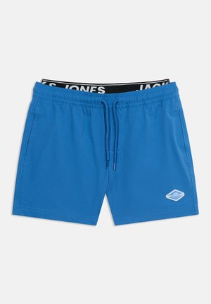 Șorturi de baie albastre pentru bărbați cu talie cu șnur și buzunare laterale, având o talie neagră cu text alb „JACK & JONES” și un mic patch cu logo.