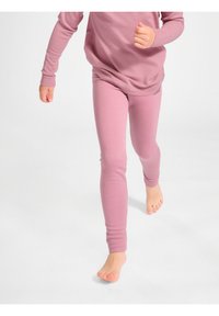 Roze katoenen leggings met een getailleerde silhouet, zachte textuur en elastische tailleband, ontworpen voor actieve beweging.
