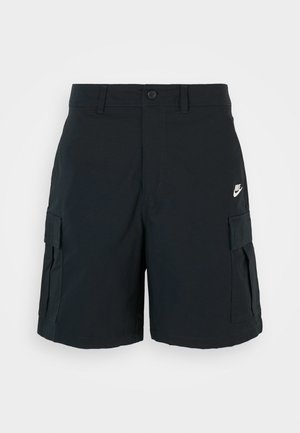 Black cargo shorts made of lightweight material, featuring two side pockets, one flap pocket, and a small white logo on the thigh.