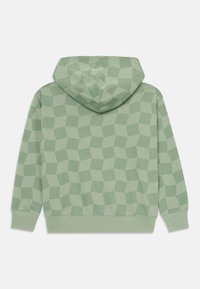 Felpa con cappuccio verde chiaro a motivo geometrico a cubi. Realizzata in tessuto morbido, presenta una vestibilità rilassata e polsini e orlo a coste.